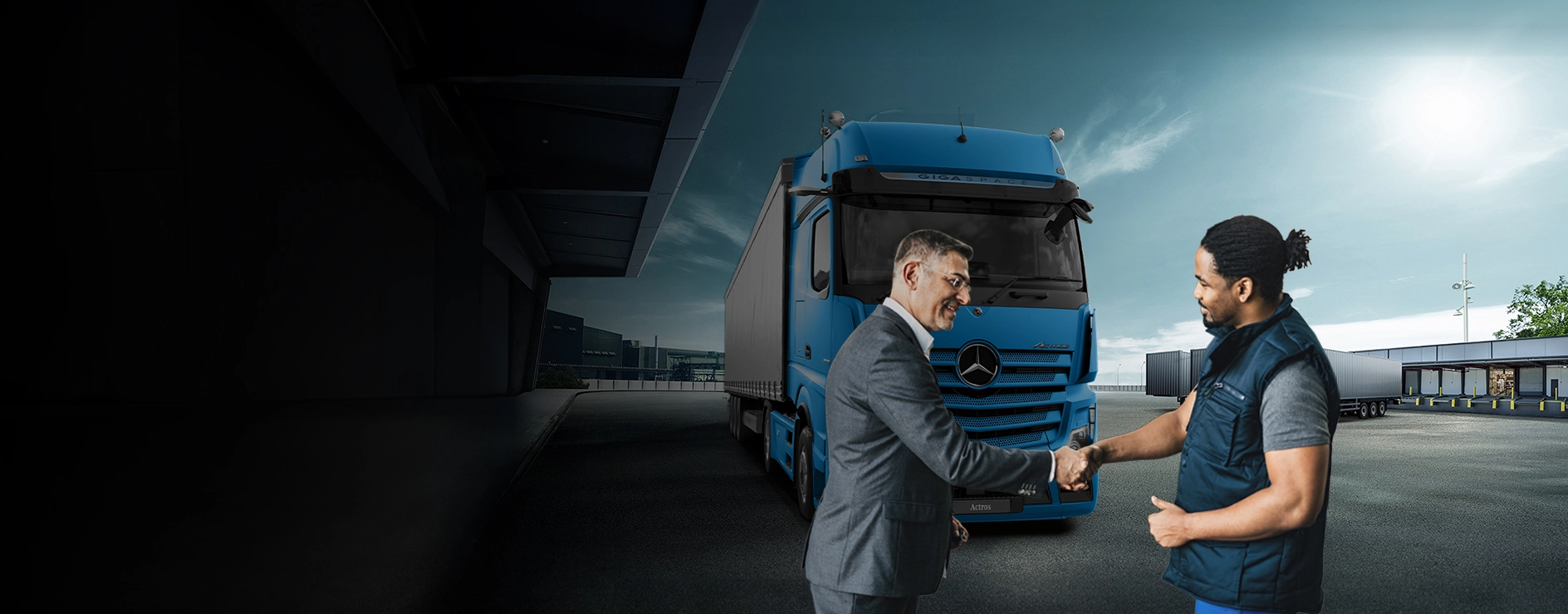 A Mercedes-Benz Actros being handed over to a service technician